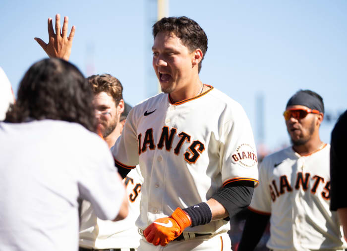 SF Giants infielder Wilmer Flores celebrates a walk-off homer. (2022)